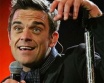 Robbie Williams kész visszatérni a Take That együttesbe